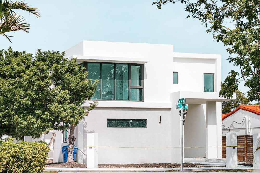 Example of project completed by Miami residential remodeling company, NXT Construction. The exterior of a minimalist contemporary single family home in Miami.